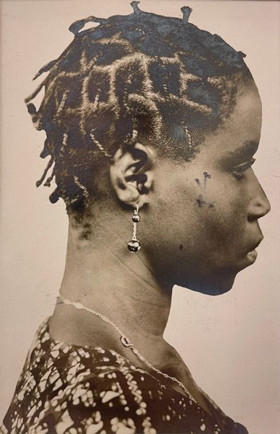 ANONYME. "Baule Woman, Ivory Coast". Silver print bearing the New York Times stamp...
