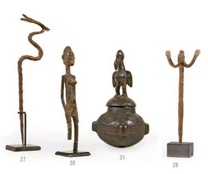 null Statuette féminine
FONCTION : Amulette protectrice.
POPULATIONS : SENOUFO (Côte...