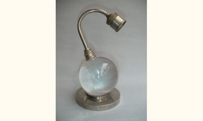null Jacques ADNET. 
Lampe moderniste constituée d'une boule de cristal de Baccarat...