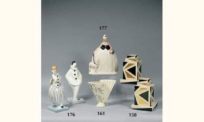 C.H. Paire de vases en forme de gratte-ciel...