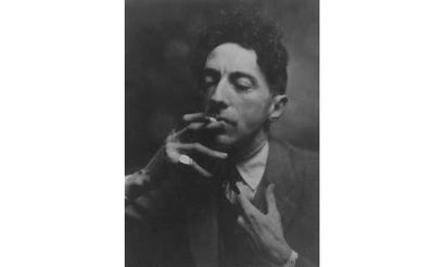 null ALBIN-GUILLOT Laure 

Jean Cocteau fumant une cigarette, ca. 1935.

Tirage argentique...