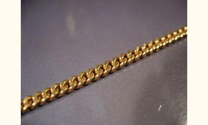 null Bracelet d'enfant en or jaune maille gourmette .
Poids : 3.70g.
Longueur: 14...