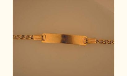 null Bracelet d'identité de bébé en or jaune maille marine et plaque vierge.
Poids...