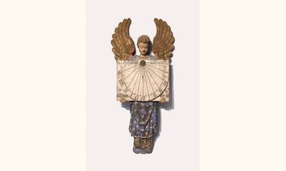 null CADRAN SOLAIRE en bois sculpté et peint à sujet d'un ange tenant le cadran.

Fin...