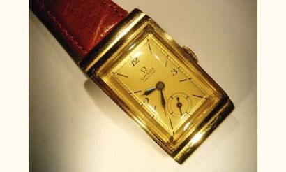 null OMEGA vers 1950
Montre bracelet en or rose, boîtier rectangle, anses de type...