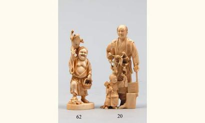 null Okimono en ivoire représentant un bûcheron et son fils tenant une hache.

Signé...