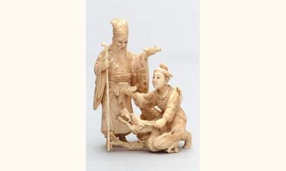 null Okimono en ivoire illustrant la légende de Choryo et Kosekiko, le premier chevauchant...