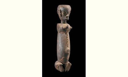 null Ibibio-Eket. (Nigéria)

Bois. h. 36 cm

Ancien et beau buste de marionnette...
