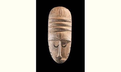 null Ibibio-Eket. (Nigéria)

Bois. h. 60 cm

Important et ancien masque au visage...