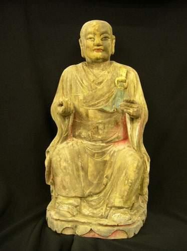 null T'SING (XIXe siècle)
Lohan assis en méditation.
En bois sculpté polychrome.
H...