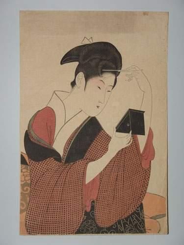 JAPON
Estampe d'Utamaro, une jeune femme...