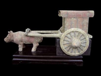 null HAN (206 av. J.C. - 220 ap. J.C.)
Chariot tiré par un buffle.
En terre cuite...