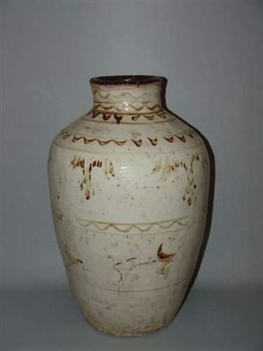 null YUAN (1279 - 1368 ap. J.C.)
Jarre « Cizhou » en terre cuite à décor brun sur...