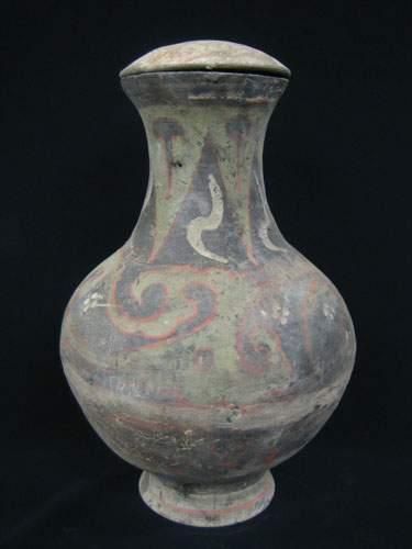 null HAN (206 av. J.C. - 220 ap. J.C.)
Vase « Hu » à couvercle et à décor de volutes
En...