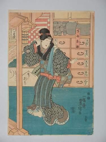 null JAPON
Estampe de Toyokuni III, une femme dans un magasin.
Vers 1845.
