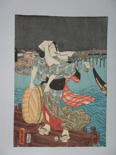 null JAPON
Estampe de Kunisada II, une femme tient un récipient.
1858.