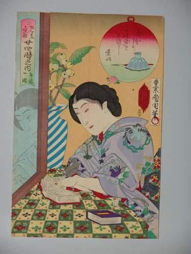 null JAPON
Estampe de Kunichika, une jeune femme lisant un livre. 1890.