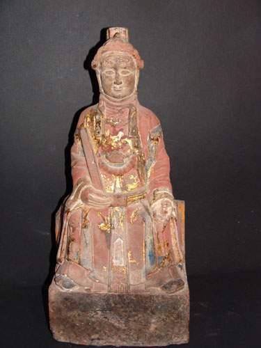 null MING (1368 - 1643 ap. J.C.)
Kwanin assise tenant dans sa main droite un sceptre.
En...