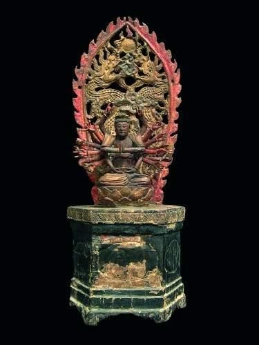 null MING (1368 - 1643 ap. J.C.)
Bouddha assis sur son trône, aux mille bras, auréolé...
