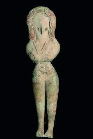null MEHRGARH (3000 - 2600 av. J.C.)
Idole féminine, les bras dissimulés sous la...