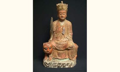 null MING (1368 - 1643 ap. J.C.)
Dignitaire assis sur un tigre, la main droite tenant...