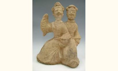 null HAN (206 av. J.C. - 220 ap. J.C.)
Pièce votive, représentant un couple uni dans...