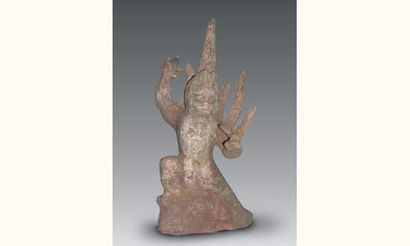 null TANG (618 - 907 ap. J.C.)
Esprit de gardien de tombe terrassant un animal en...