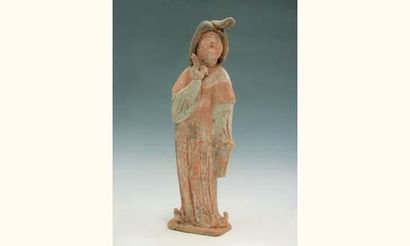 null TANG (618 - 907 ap. J.C.)
Fat Lady à la tête levée portant une large robe, et...