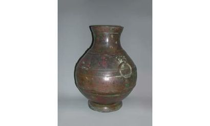 null HAN (206 av. J. C - 220 ap. J. C)
Vase HU en bronze avec inclusion de cuivre.
H...