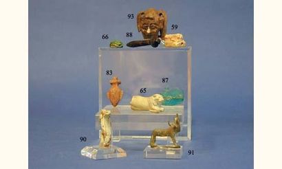 null EGYPTE
Rare amulette de lion couché sur une plateforme rectangulaire en pierre.
L.2.
Collection...