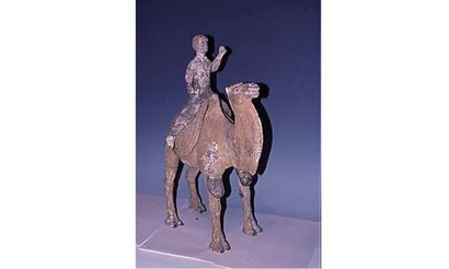 null Période Six Dynasties (420 - 589 ap JC) 

Remarquable Chamelier sur son chameau,...