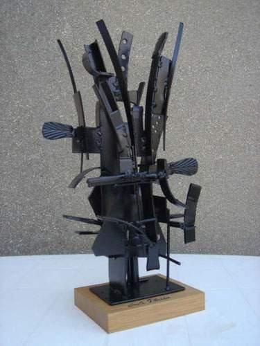 null FLORIDA Emile
Sans titre
Sculpture en métal soudé monochromé noir et socle en...