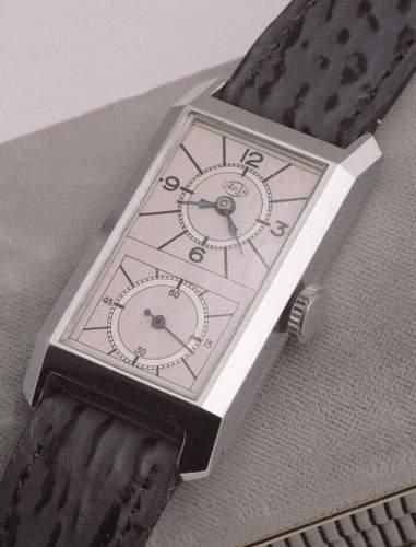null ARIS (Type Prince), vers 1940
Très belle montre rectangulaire à deux cadrans,...