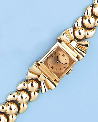Bracelet montre de dame en or jaune 14k....