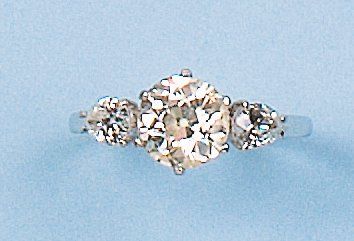 null Bague solitaire en or gris ornée d'un diamant taillé en brillant pesant 1,70...