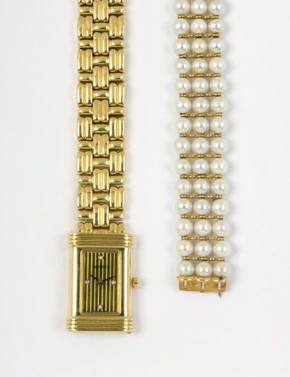 OJ PERRIN Bracelet-montre de dame en or jaune à bracelets interchangeables. Cadran...