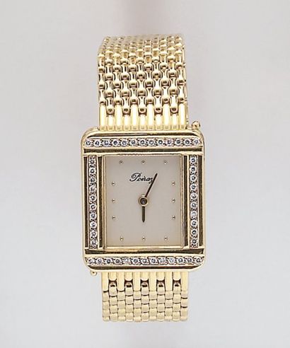 POIRAY Bracelet-montre de dame à bracelet interchangeable en or jaune. Cadran blanc....