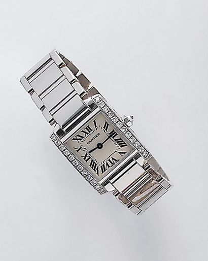 CARTIER "TANK FRANÇAISE". Bracelet-montre de dame en or gris. Cadran blanc à chiffres...