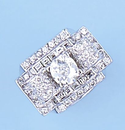 null Bague en platine sertie de diamants taillés en brillant et diamants baguette...