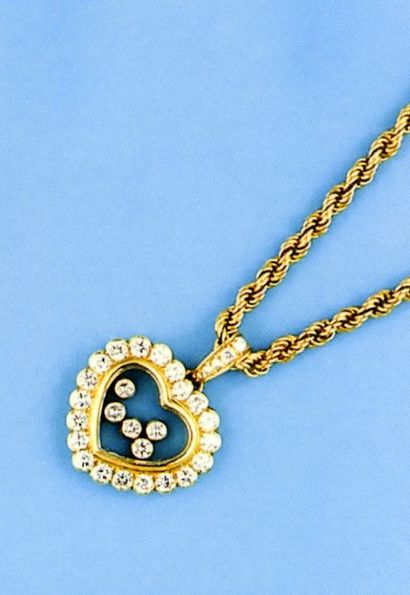 CHOPARD Chaîne en or jaune torsadé et pendentif "Coeur" en or jaune serti de diamants...