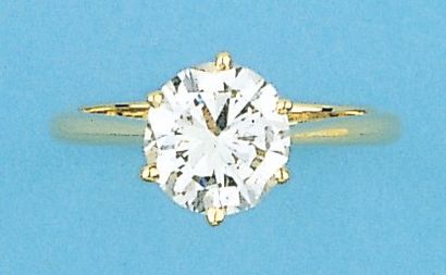 null Bague solitaire en or jaune ornée d'un diamant taillé en brillant pesant 1,80...