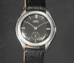 UWECO GENEVE N° 7462 vers 1940. Montre bracelet ronde en acier et nickel chromé....