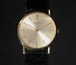 UNIVERSAL GENEVE MAUBOUSSIN n°2266939 vers 1962. Montre bracelet en or, boîtier rond,...