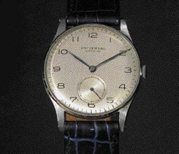 UNIVERSAL GENEVE N° 847237 vers 1941. Montre bracelet ronde en acier et nickel chromé....