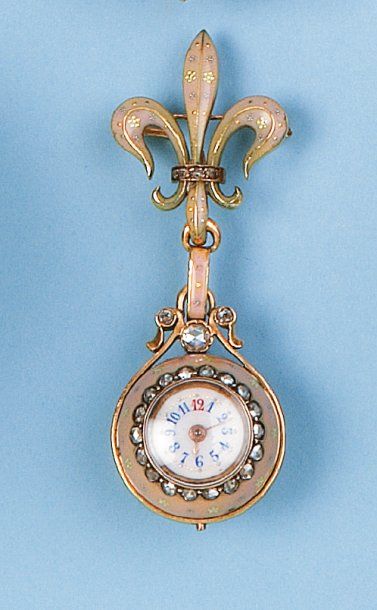 null Montre "Boule" et broche porte - montre en or jaune et émail rose sertie de...