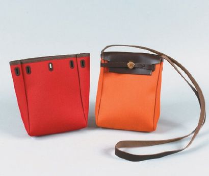 HERMÈS Paris made in France Mini sac «Airbag» à l?épaule en toile orange, toile rouge...