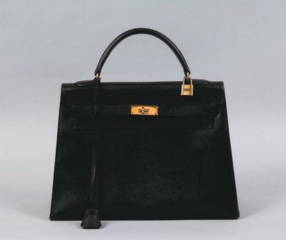 HERMES Paris Sac «Kelly» 33 cm en cuir gréné noir (teinture), doublé de cuir camel,...