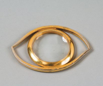 HERMES Paris Loupe en forme d'oeil en métal doré.