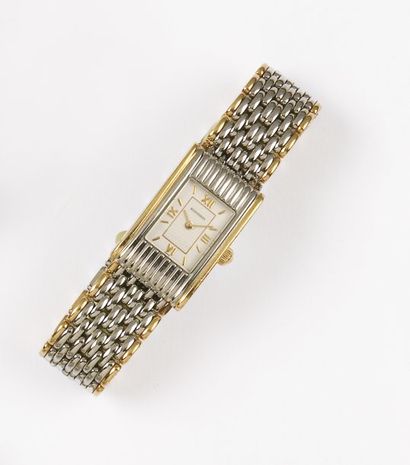 BOUCHERON «REFLET PETIT MODELE» Bracelet montre de dame en or jaune et acier. Cadran...