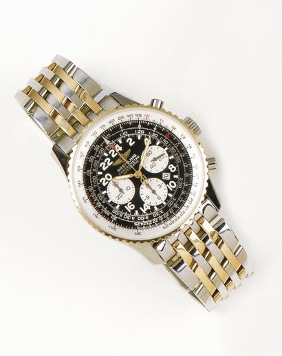 BREITLING «NAVITIMER COSMONAUTE» Bracelet montre chronographe en or jaune et acier....
